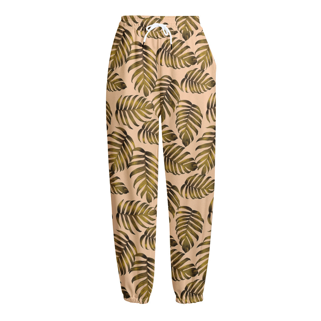 Yellow Monstera Leaves Pattern Print Fleece Lined Knit Pants Yellow Monstera Leaves Pattern Print Fleece Lined Knit Pants