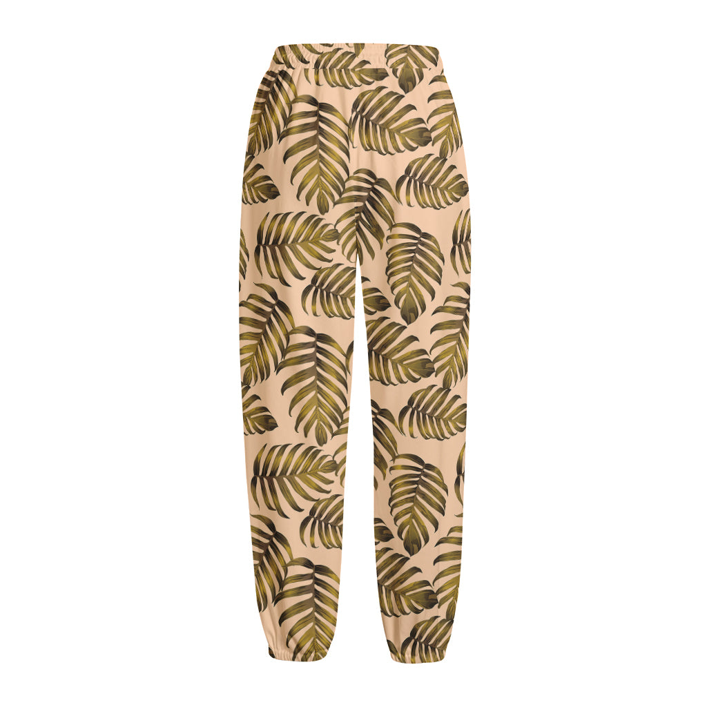 Yellow Monstera Leaves Pattern Print Fleece Lined Knit Pants Yellow Monstera Leaves Pattern Print Fleece Lined Knit Pants